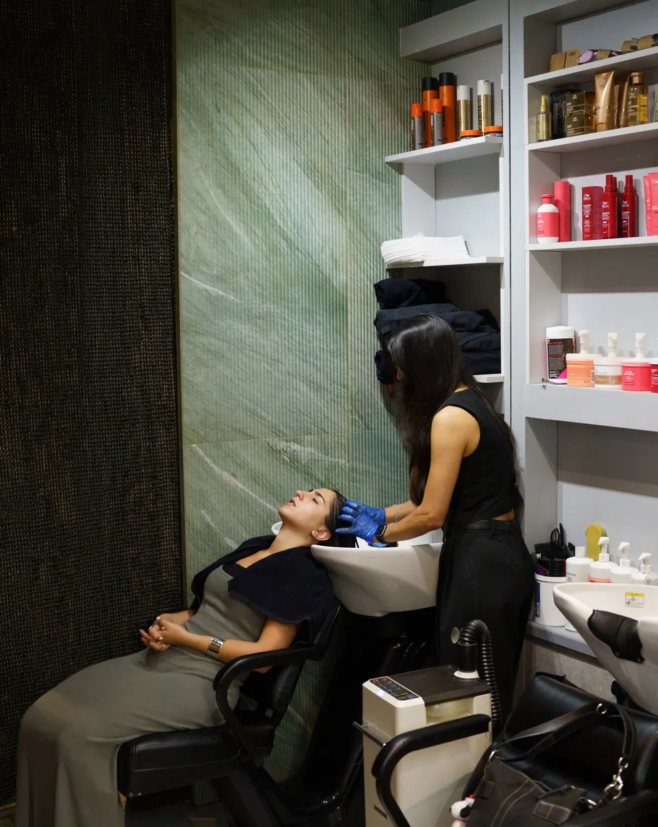 A client at the wash basin